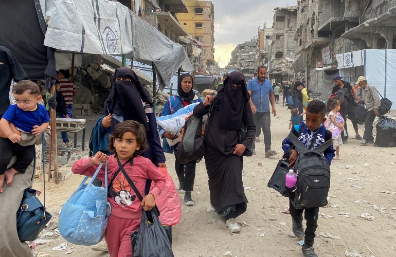Des Palestiniens déplacés fuient les zones du nord de la bande de Gaza suite à un ordre d'évacuation israélien. REUTERS/Hussam Al-Zaanin
