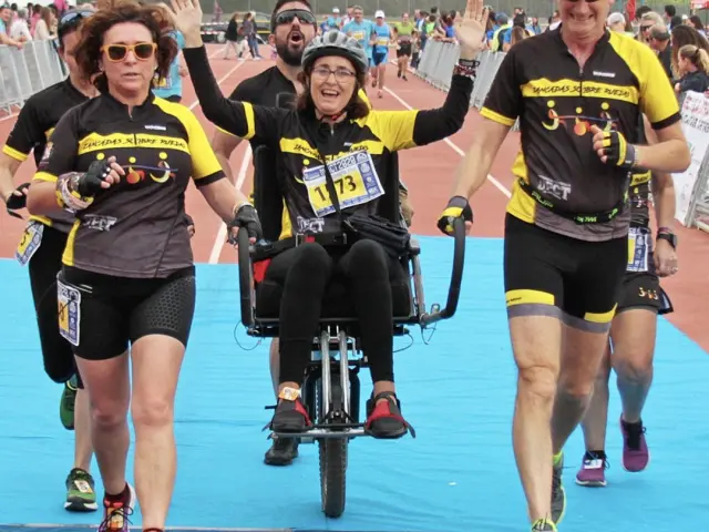 María José, en une course avec une chaise Joëlette