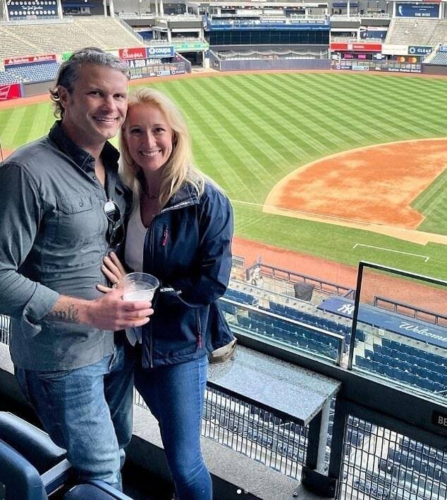 Trump's defense secretary pick is pictured with his wife Jennifer at a baseball game