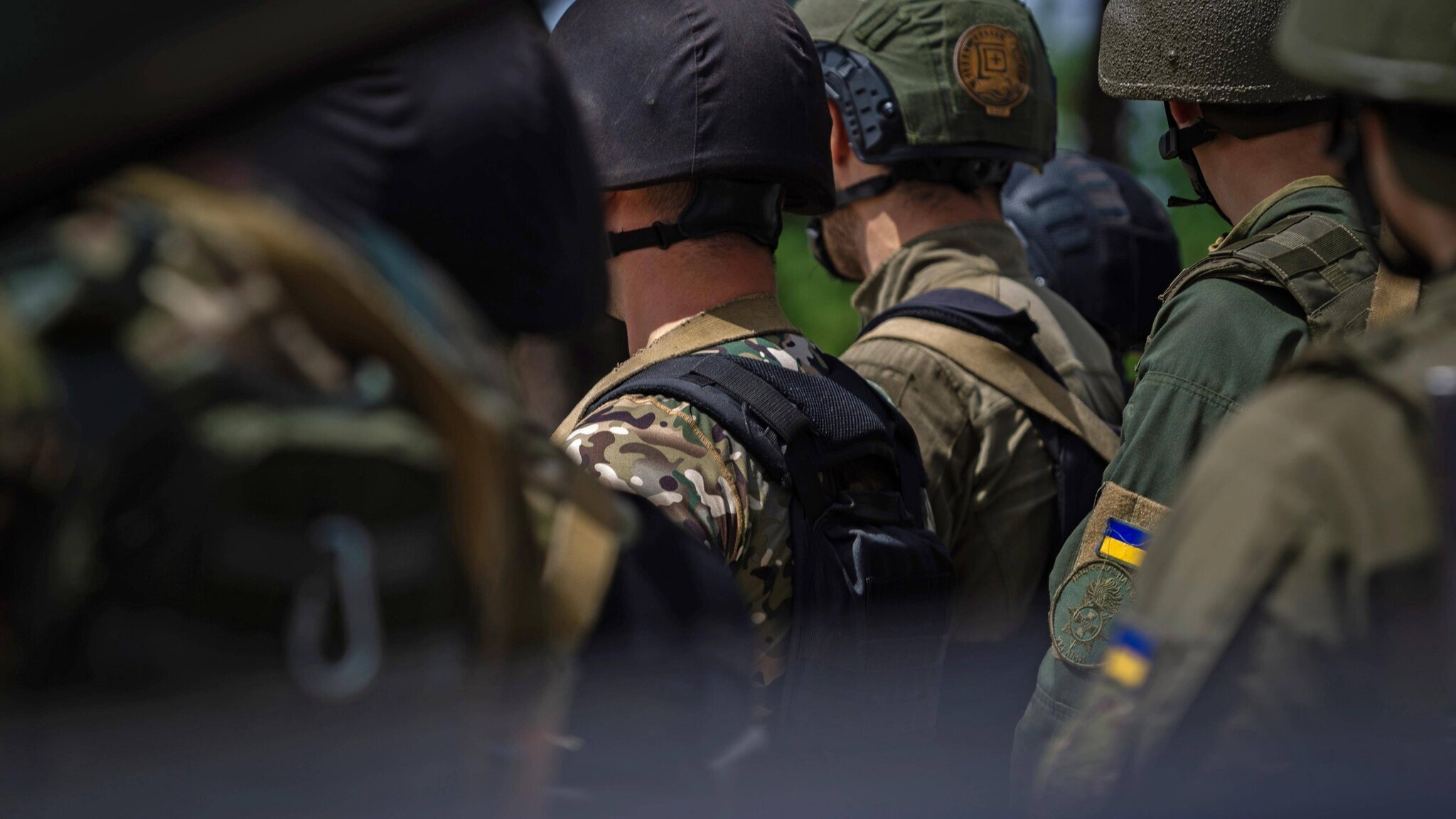 Ukrainian soldiers from behind