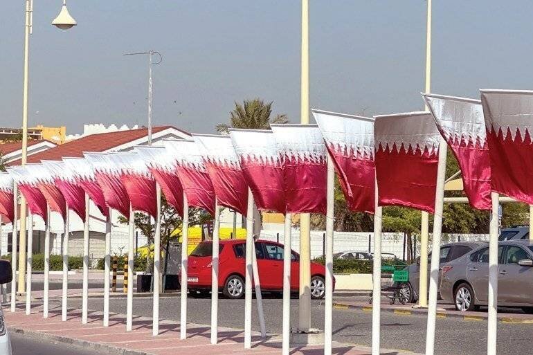 Les rues du Qatar aux couleurs de son drapeau