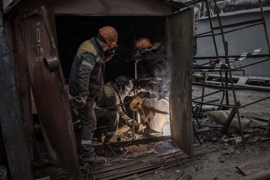 Workers at a Ukrainian thermal power plant are repairing the facility after rocket strikes to restore power as temperatures drop, Oct. 4.