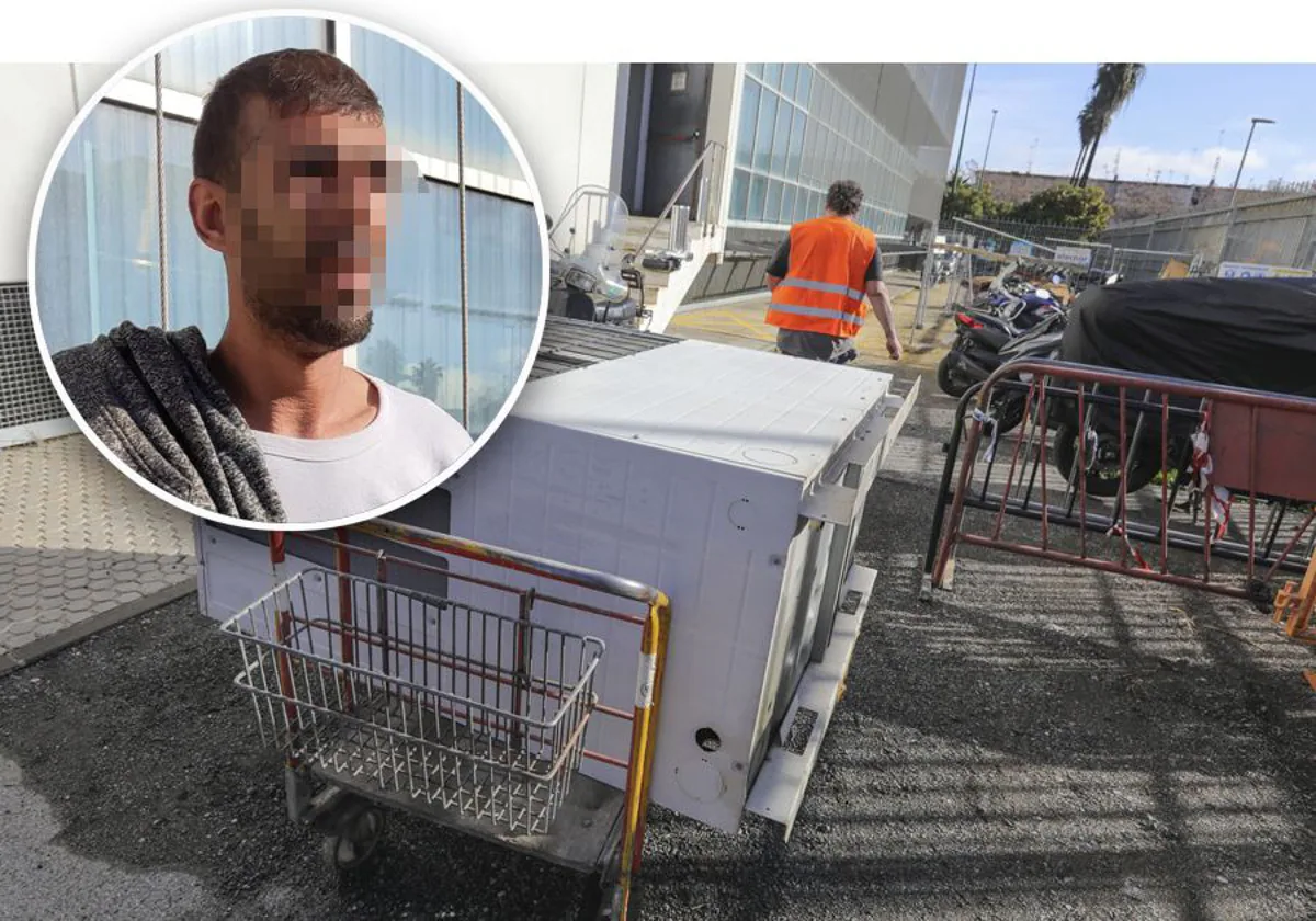 L'homme arrêté avec un climatiseur sur un chariot