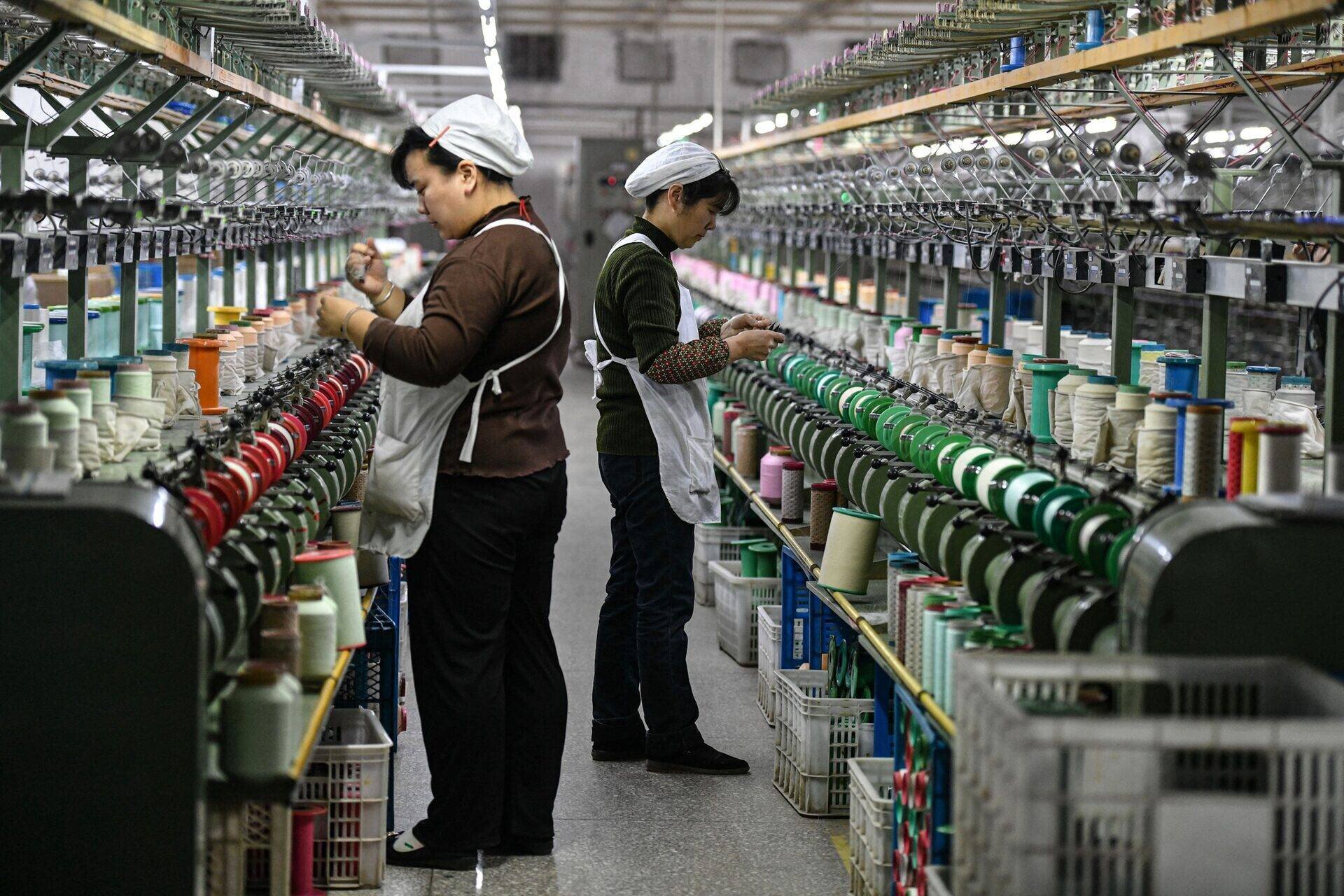 Travailleurs dans une usine de textile en Chine