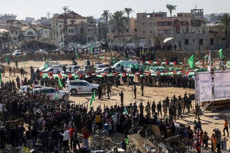 Red Cross vehicles waiting for the handover of Israeli hostages