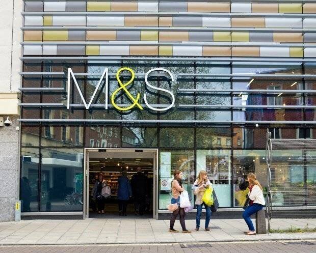 Shoppers outside a Marks & Spencer store in Norwich.