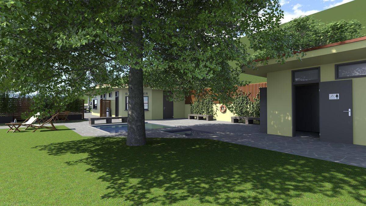 Jardin moderne avec pelouse, arbre central, chaises longues et bâtiments bas en arrière-plan.