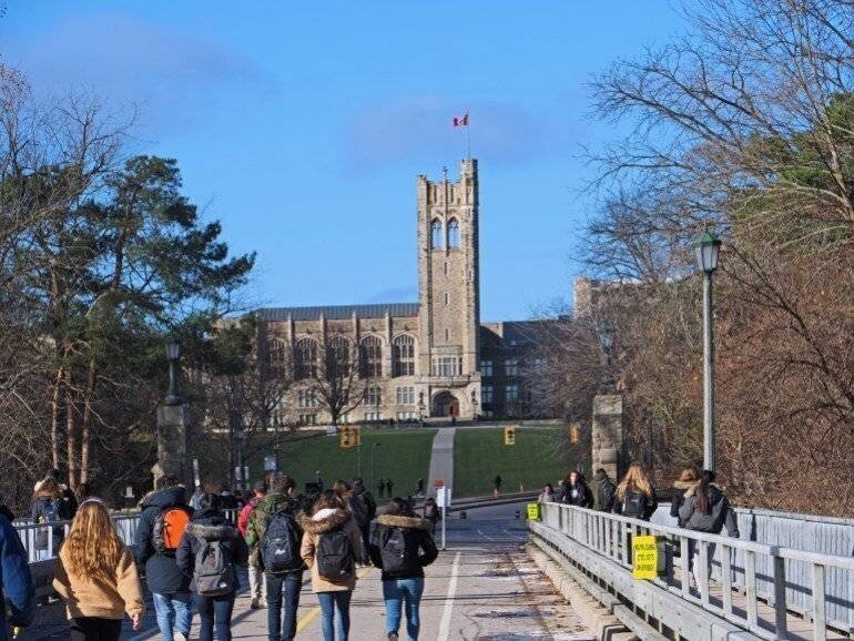 Students crossing a bridge to the University of Western Ontario