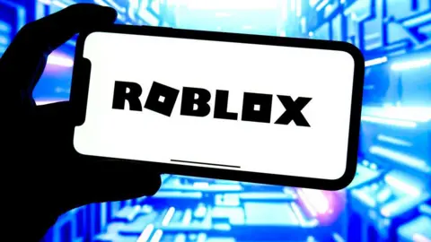 Logo de Roblox sur un fond néon