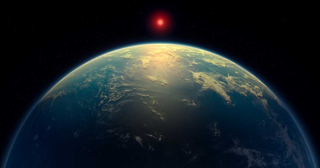 Impression artistique d'une planète océanique avec atmosphère d'hydrogène telle que K2-18b