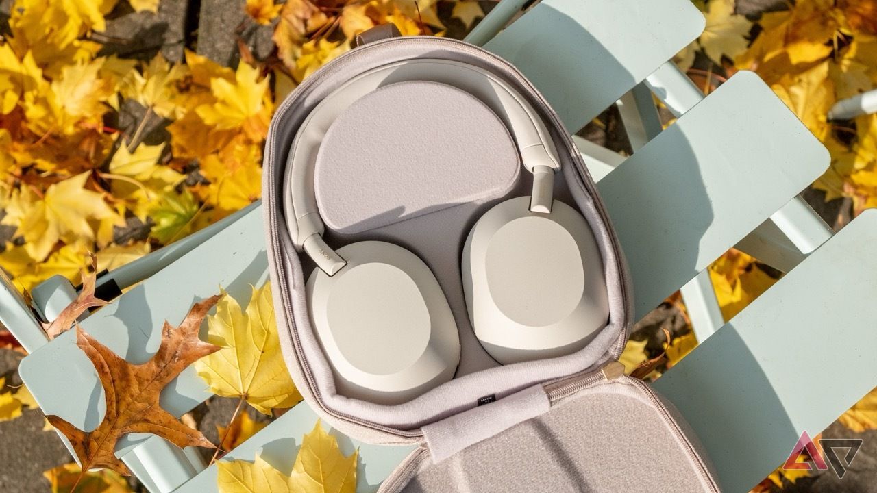 Sony WH-1000XM5 headphones on a chair outdoors