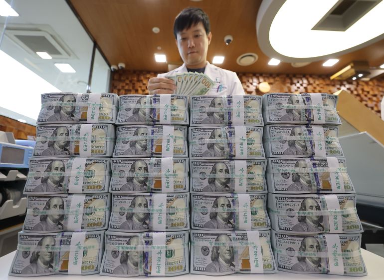Retrait institutionnel du dollar sur la scène mondiale