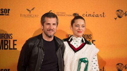 Guillaume Canet et Marion Cotillard, à Bruxelles, le 23 avril 2019. (BERTRAND VANDELOISE / HANS LUCAS / AFP)