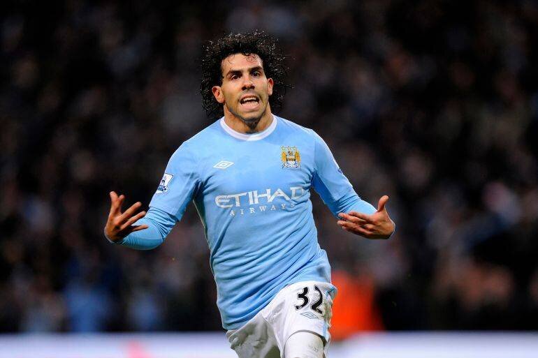 Carlos Tévez célèbre un but avec Manchester City