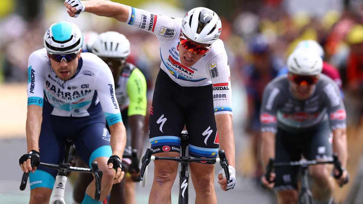 Tim Merlier sur le podium du Tour de France