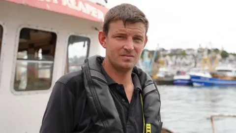 Tom Parker sur son bateau de pêche