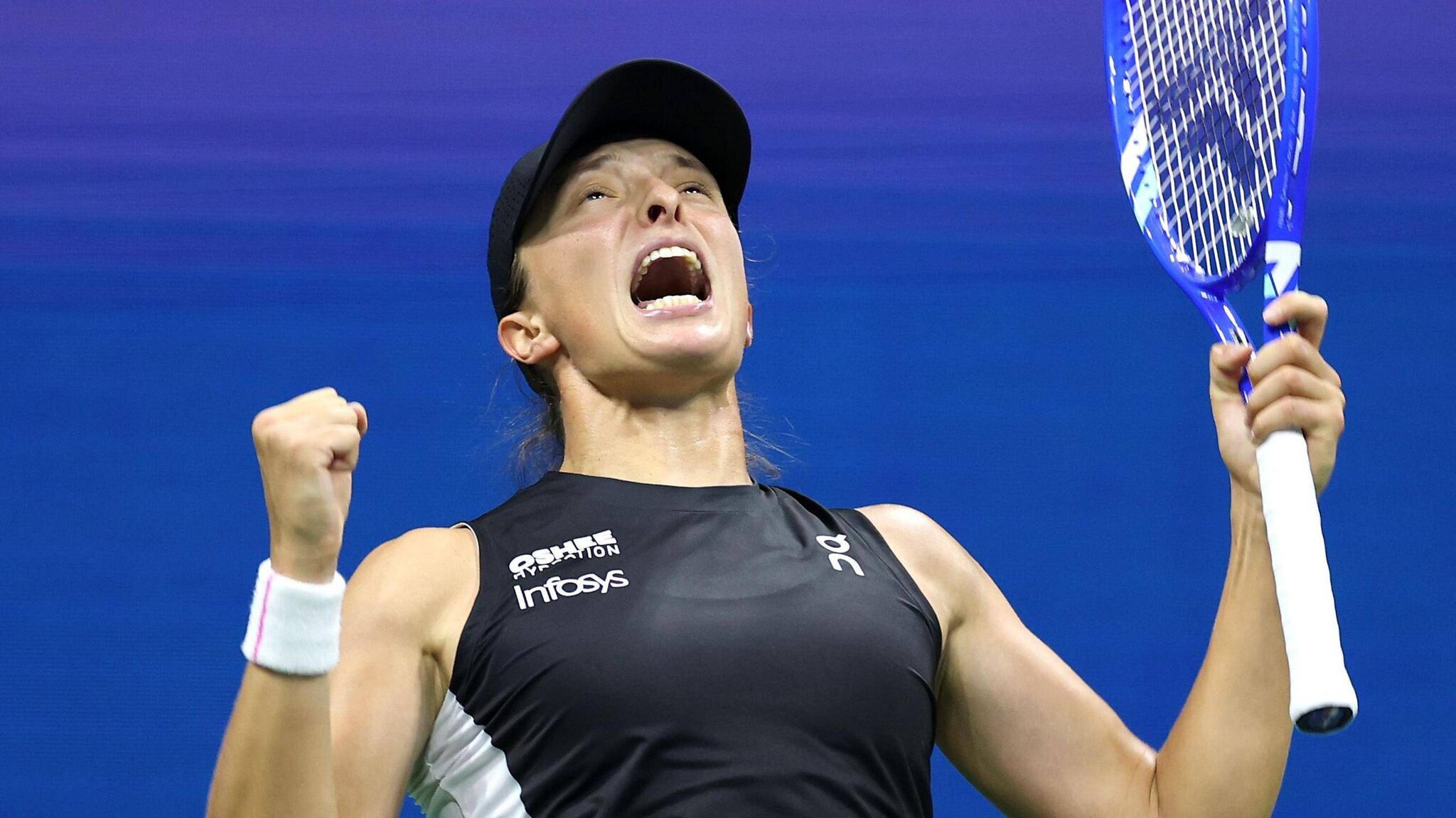 Iga Swiatek célébrant un point au US Open