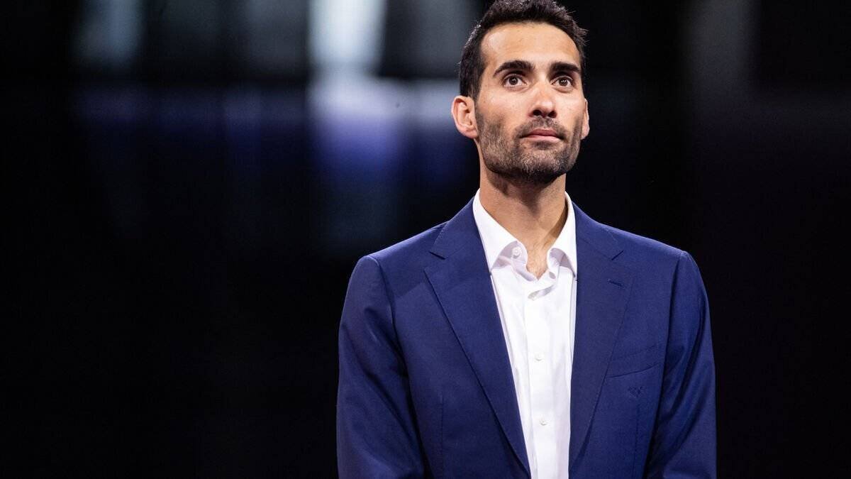 Martin Fourcade lors d'une cérémonie liée à Milan-Cortina 2026