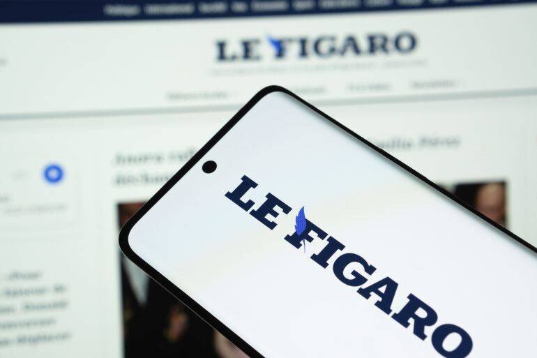 Logo du Figaro affiché sur des écrans