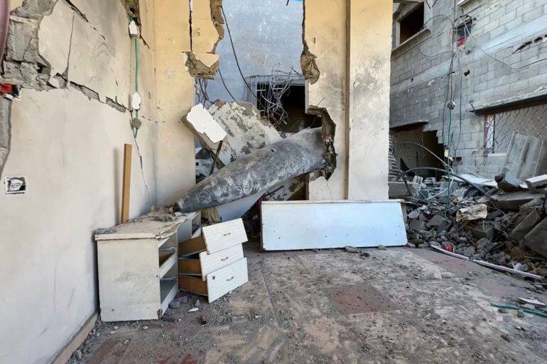 Maison avec projectile non explosé