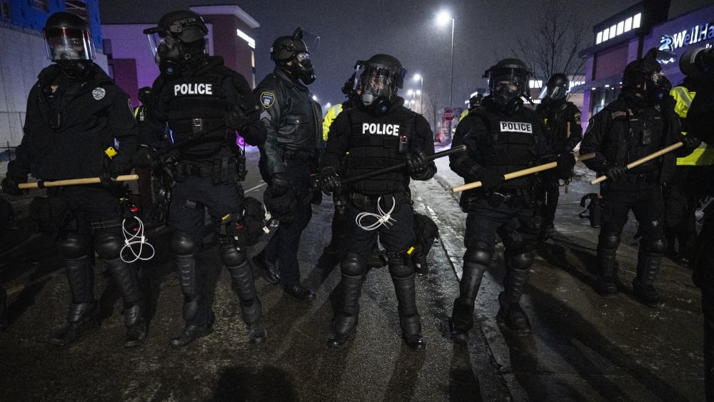 Minneapolis police form a line near protestors